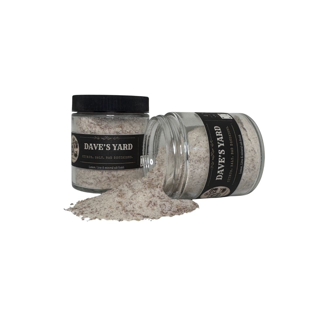 Two jars of 'Dave's Yard' product with one open showing a powder-like substance on a white background.