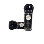 Two pepper mills with vanilla and black pepper labels on a white background