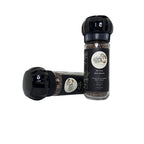 Two pepper grinders with visible brand logo on a white background