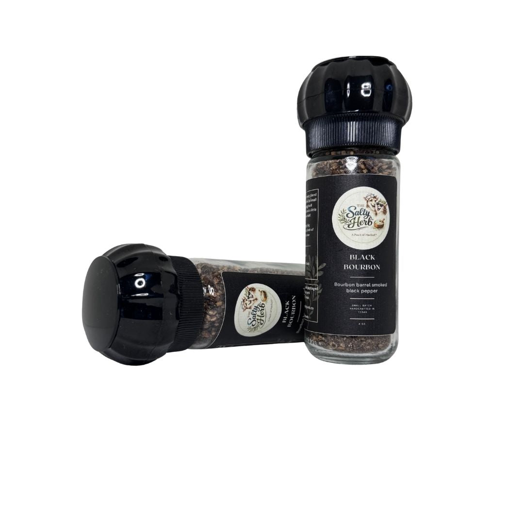 Two pepper grinders with visible brand logo on a white background